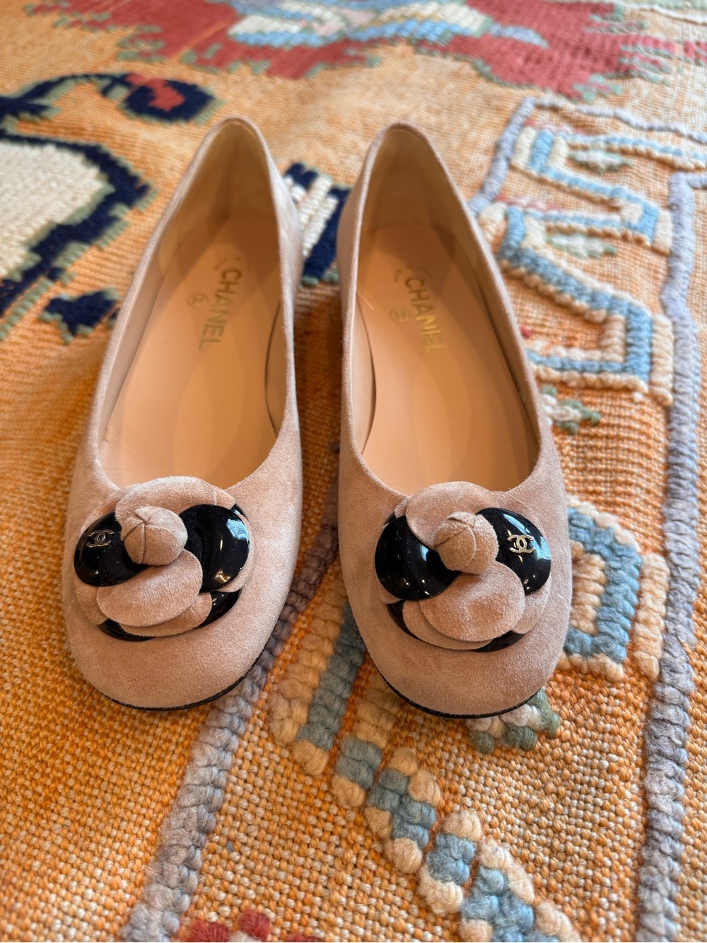 CHANEL Beige Suede Camellia-Embellished Ballet Flats with Black Accents